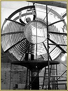 Rebuilding the Second Order Fresnel lens from White Shoal lighthouse at the Great Lakes Shipwreck Museum at Whitefish Point, in Michigan's Upper Peninsula. Click to view an enlarged version.